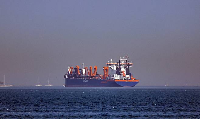 A vessel is seen anchored off the coast of Dubai, United Arab Emirates, on March 1. [EPA/YONHAP]