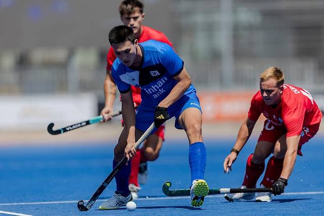 한국과 칠레의 경기 모습.  [FIH 소셜 미디어 사진. 재판매 및 DB 금지]