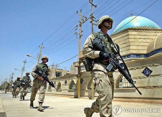 2003년 6월 미국의 이라크 침공 때 파병된 미군 병사들 [EPA 연합뉴스 자료사진. 재판매 및 DB 금지]