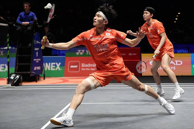 South Korea's Kim Won-ho (L) and Seo Seung-jae (R) play a shot against Malaysia?s Soh Wooi Yik and Aaron Chia during the men's doubles final at the All England Open Badminton Championships at the Utilita Arena in Birmingham, central England on March 8, 2026.  (Photo by Darren Staples / AFP)







<저작권자(c) 연합뉴스, 무단 전재-재배포, AI 학습 및 활용 금지>