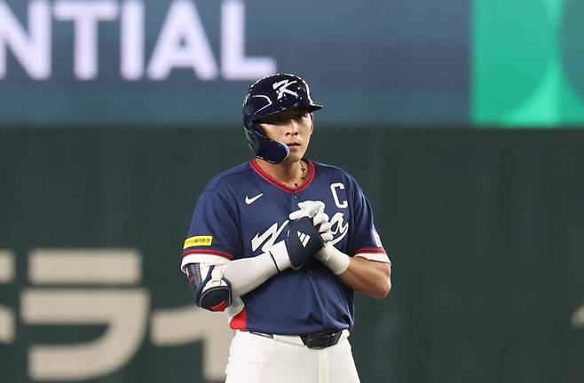 <yonhap photo-6434="">9일 일본 도쿄돔에서 열린 2026 월드베이스볼클래식(WBC) C조 조별리그 최종전 대한민국과 호주의 경기. 3회초 무사 2루 한국 이정후가 1타점 2루타를 친 뒤 기도하고 있다. [사진=연합뉴스]</yonhap>