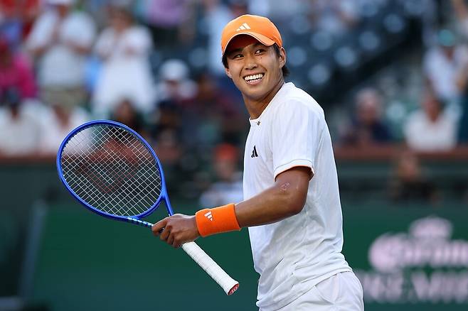 승리 확정 후 활짝 웃는 러너 티엔 / 게티이미지코리아