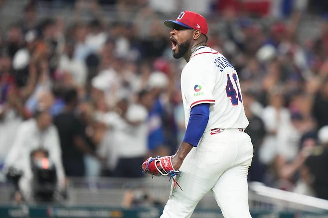 Dominican Republic pitcher Luis Severino (40) reacts during the fourth inning of a World Baseball Classic semifinal game against the United States, Sunday, March 15, 2026, in Miami. (AP Photo/Lynne Sladky)