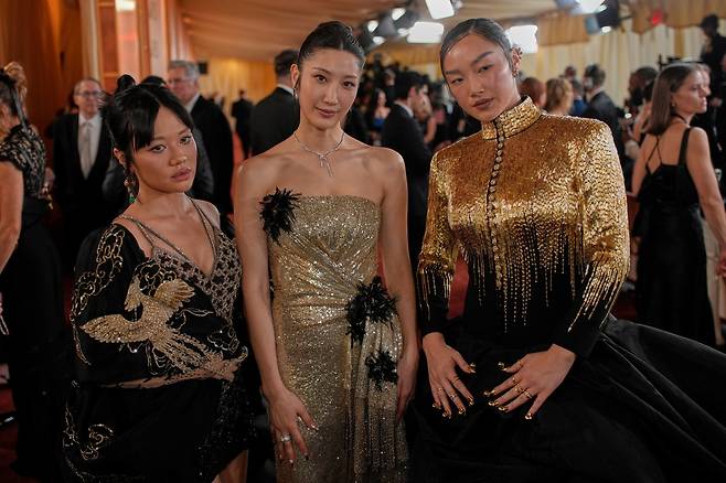 Rei Ami,from left, Ejae, Audrey Nuna arrive at the Oscars on Sunday, March 15, 2026, at the Dolby Theatre in Los Angeles. (AP Photo/John Locher)