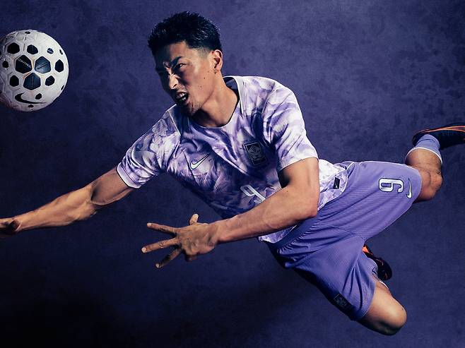 National football team player Cho Gue-sung models the new purple uniform designed by Nike [NIKE]