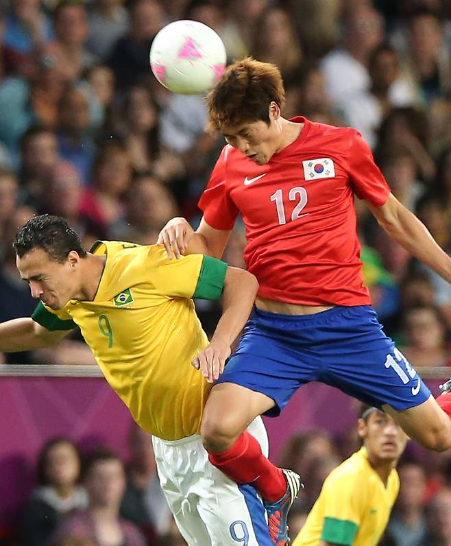 2012년 런던 올림픽에서 활약한 황석호(오른쪽) [연합뉴스 자료사진]