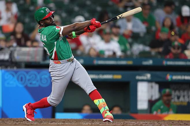 HOUSTON, TEXAS - MARCH 06: Randy Arozarena #56 of Team Mexico hits an hits an RBI single in the ninth inning against Team Great Britain during the 2026 World Baseball Classic Pool B game at Daikin Park on March 06, 2026 in Houston, Texas. Alex Slitz/Getty Images/AFP (Photo by Alex Slitz / GETTY IMAGES NORTH AMERICA / Getty Images via AFP)
<저작권자(c) 연합뉴스, 무단 전재-재배포, AI 학습 및 활용 금지>