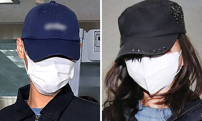 50대 장모를 살해하고 여행용 가방(캐리어)에 담아 대구 북구 신천 잠수교 인근에 버린 혐의(존속살해 등)를 받는 20대 사위(왼쪽)와 시체유기 등 범행에 가담한 20대 딸이 2일 오전 구속 전 피의자 심문(영장실질심사)을 받기 위해 대구지방법원에 도착하고 있다. 뉴스1