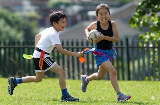 태그럭비는 몸싸움이 없기 때문에 아이들이 놀이처럼 안전하게 즐길 수 있다는 장점이 있다. 이미지=AI 생성