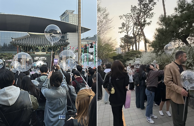 Left: Visitors gather near the stage 10 minutes before the event begins. Right: A long line forms at 6:20 p.m., about 40 minutes ahead of the party at Bongeunsa. (Tammy Park/The Korea Herald)