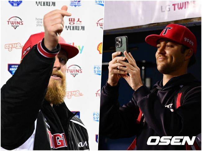 올러의 모습 휴대전화에 담고