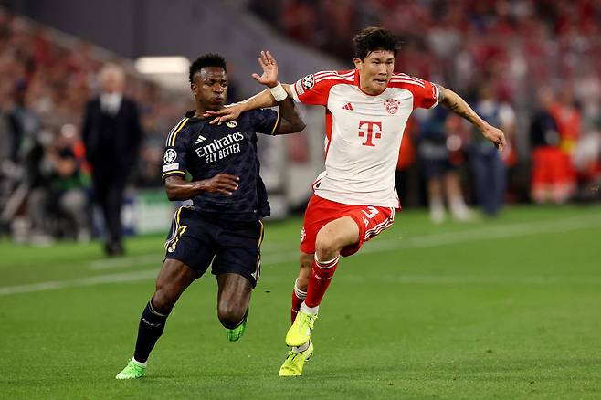 바이에른 뮌헨 김민재가 2024년 UCL 준결승 1차전에서 레알 마드리드 비니시우스를 막고 있다. Getty Images코리아