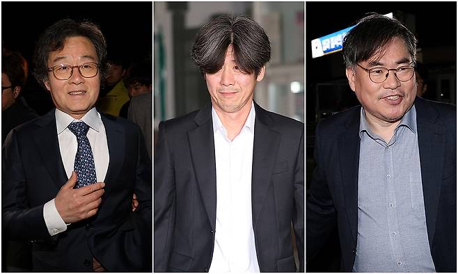 대장동 개발 비리 의혹으로 기소돼 1심에서 유죄 선고를 받은 민간업자들이 구속 기한 만료로 석방돼 30일 경기도 의왕시 서울구치소를 나서고 있다. 왼쪽부터 화천대유자산관리 대주주 김만배씨, 남욱 변호사, 유동규 전 성남도시개발공사 기획본부장. 연합뉴스