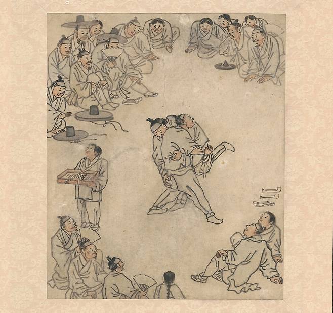 ‘단원 김홍도, 시대를 그리다’에 전시되는 ‘단원풍속도첩’ 중 ‘씨름’.   국립중앙박물관 제공
