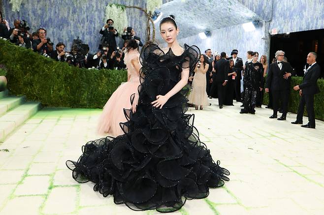 aespa's Ningning poses for photos at the 2026 Met Gala celebrating ″Costume Art″ at the Metropolitan Museum of Art in New York on May 4. [AFP/YONHAP]