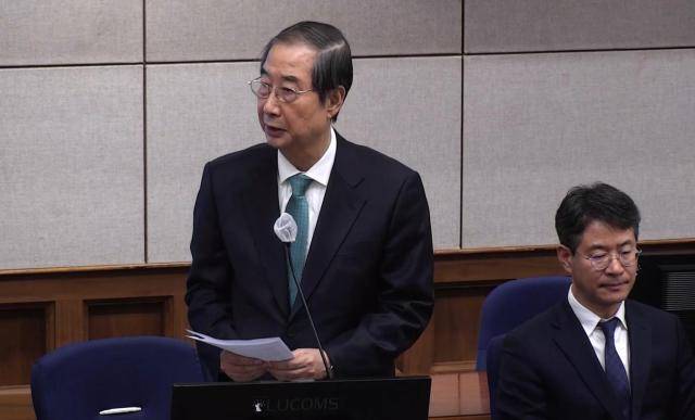 한덕수 전 국무총리가 2025년 11월26일 서울 서초구 서울중앙지법에서 열린 결심공판에서 최후진술하는 모습. 연합뉴스