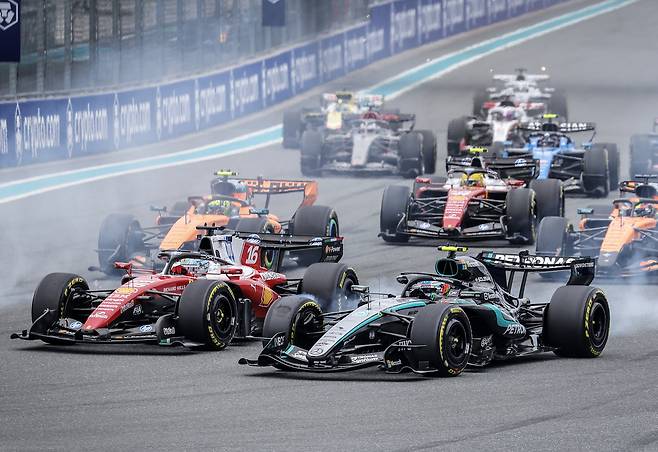Mercedes driver Andrea Kimi Antonelli of Italy (right) and Scuderia Ferrari driver Charles Leclerc of Monaco compete in the Formula 1 Miami Grand Prix at the Miami International Autodrome in Miami Gardens, Florida, May 3. (EPA)