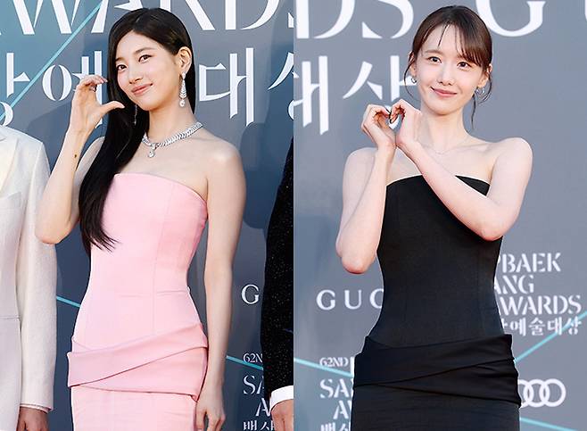 배우 수지와 윤아가 제62회 백상예술대상에서 같은 디자인, 다른 색상의 드레스를 소화했다. /사진=뉴시스, 김휘선 기자 hwijpg@