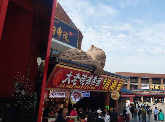 Terracota warrior guards an ice cream stand in Xi'an, China [JOEL DOWN]