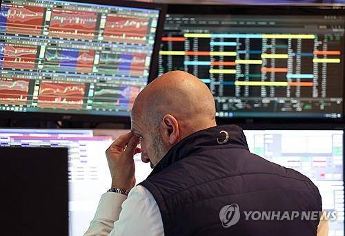 뉴욕증권거래소의 트레이더 [AFP 연합뉴스 자료사진. 재판매 및 DB 금지]