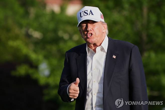 미중정상회담 후 백악관으로 돌아온 트럼프 (워싱턴 AP=연합뉴스)
