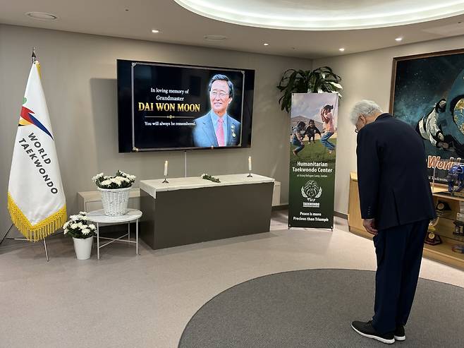 A visitor pays tribute at a memorial altar for Grand Master Moon Dai-won set up at World Taekwondo headquarters in Seoul. World Taekwondo said the altar would remain in place from May 18 to 20 to honor Moon’s legacy. (World Taekwondo)