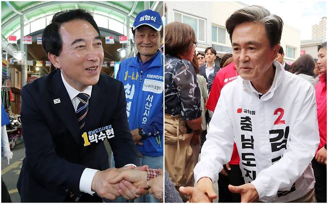 충남지사 박수현 더불어민주당 후보와 김태흠 국민의힘 후보가 22일 오전 충남 서산 동부시장 선거 유세에서 지지자와 인사를 나누고 있다. /신현종 기자