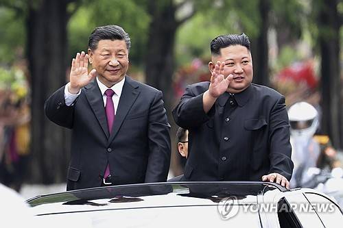 시진핑 중국 국가주석과 김정은 북한 국무위원장 [AP 연합뉴스 자료사진. 재판매 및 DB 금지]