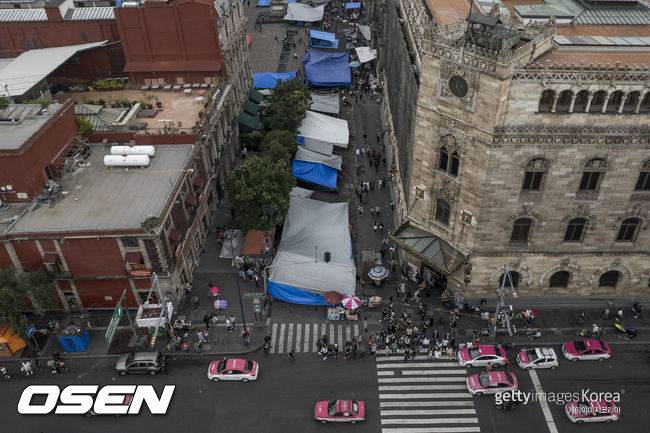 MEXICO CITY, MEXICO - MAY 18: Aerial view of the encampment set up by teachers from the National Coordinator of Education Workers (CNTE) in the streets of the historic center of Mexico City on May 18, 2026 in Mexico City, Mexico. (Photo by Cristopher Rogel Blanquet/Getty Images)Just days before the opening of the 2026 World Cup, the Mexico City government is maintaining security barriers due to protests by teachers from the National Coordinator of Education Workers (CNTE).