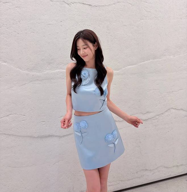 Actress Han Ji-hye showed off her youthful visuals, full of innocent beauty.On the 10th, Han Ji-hye posted several photos on her social media account along with the caption, You must pay attention to scalp health this summer. The secret to beautiful, voluminous hair.In the photos, Han Ji-hye is wearing a sky-blue silk skirt set. The floral embellishments placed throughout the dress caught the eye.On this day, Han Ji-hyes clear, youthful appearance, free of a single wrinkle, particularly drew attention. She added her signature innocent charm by styling her hair with loose waves.Furthermore, her flawless figure drew admiration.Han Ji-hye had previously revealed her dedication to self-care by sharing updates of herself working out last May. It was surprising to see Han Ji-hye maintaining a flawless figure while balancing childcare and work.Meanwhile, Han Ji-hye, born in 1984 and currently 41 years old, gave birth to a daughter in 2021, 11 years after marrying her prosecutor husband in 2010.Photo = Han Ji-hyes account