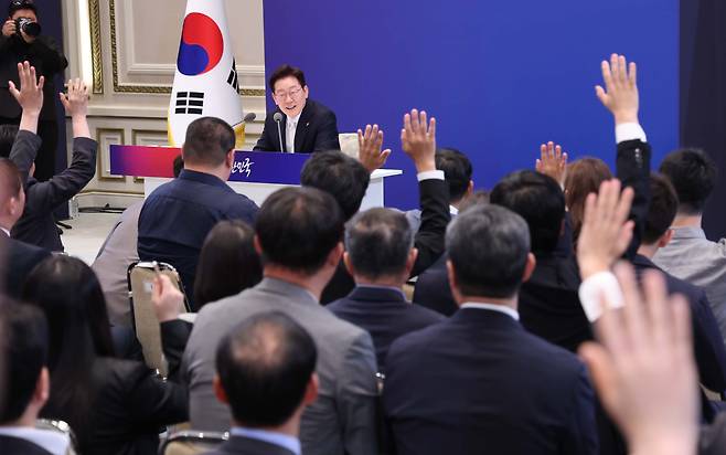 President Lee Jae Myung takes questions from reporters during a press conference marking one year in office that was held at the Blue House on June 8. JOINT PRESS CORPS