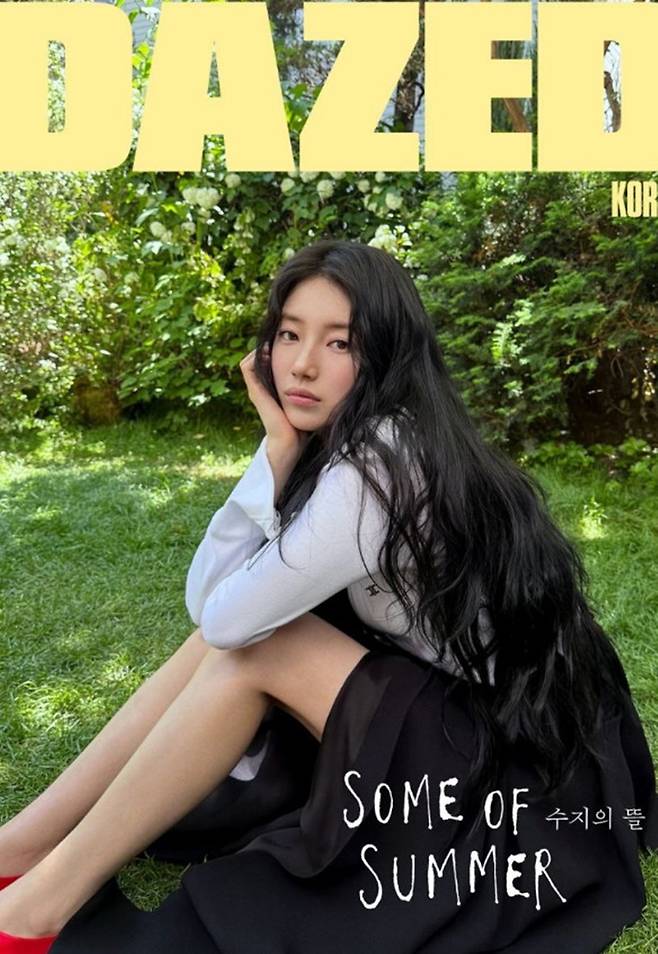 Actress and singer Bae Suzy has captured attention by releasing pictorial photos taken with Dazed Korea magazine on her personal account. Against a backdrop of lush nature, Bae Suzy exuded a refreshing yet innocent charm, elevating the quality of the pictorial.In the released photos, Bae Suzy created a sophisticated atmosphere by matching a black shirt with pants, while adding a dreamy vibe with a patterned dress. She also showcased a captivating allure by perfectly pulling off a black dress that revealed her shoulder line.Bae Suzys appearance, with her long black hair and distinct features harmonizing, drew admiration for her unrealistically stunning visuals. Through natural poses and deep gazes alone, Bae Suzy revealed a presence that transcended the pictorial, completing an unrivaled aura.