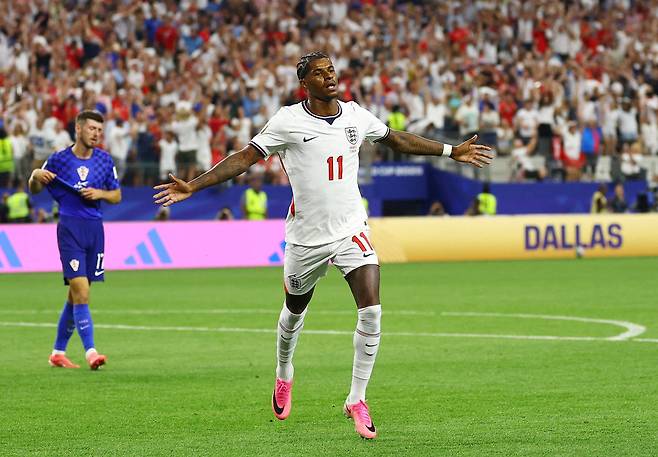 Soccer Football - FIFA World Cup 2026 - Group L - England v Croatia - Dallas Stadium, Arlington, Texas, U.S. - June 17, 2026 England's Marcus Rashford celebrates scoring their fourth goal REUTERS/Kai Pfaffenbach TPX IMAGES OF THE DAY/2026-06-18 07:15:09/ <저작권자 ⓒ 1980-2026 ㈜연합뉴스. 무단 전재 재배포 금지, AI 학습 및 활용 금지>