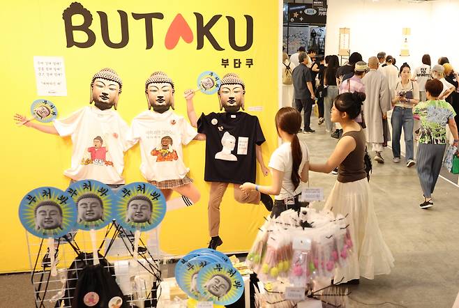 Visitors enjoy the 2025 Busan International Buddhism Expo held in the southern port city on Aug. 7, 2025. YONHAP