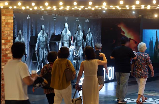 Moviegoers are seen at a theater in Seoul on Aug. 23. YONHAP