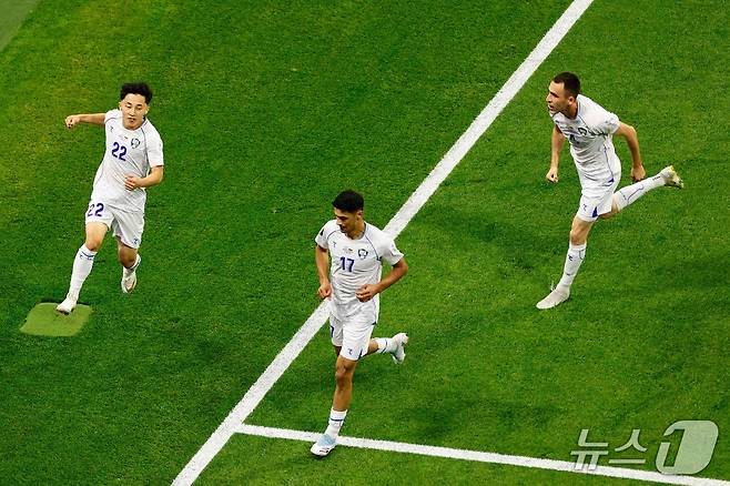 우즈베키스탄 선수들의 경기 모습 ⓒ AFP=뉴스1