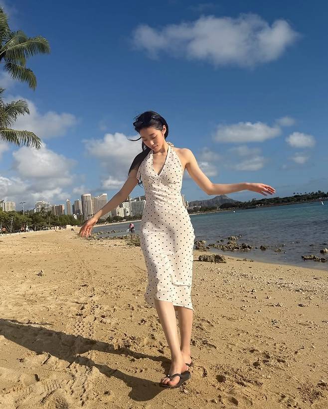 On the 18th, Noh Yoon-seo posted several photos on her Instagram with the caption Aloha.The photos show Noh Yoon-seo enjoying a relaxing time at the beach.Wearing a white halterneck dress with polka dots, Noh Yoon-seo drew attention by showcasing her innocent charm and a slim figure with not a single ounce of excess fat. In particular, her slender back view drew admiration.Meanwhile, Noh Yoon-seo recently met viewers through the Netflix series *The Crown Prince*.