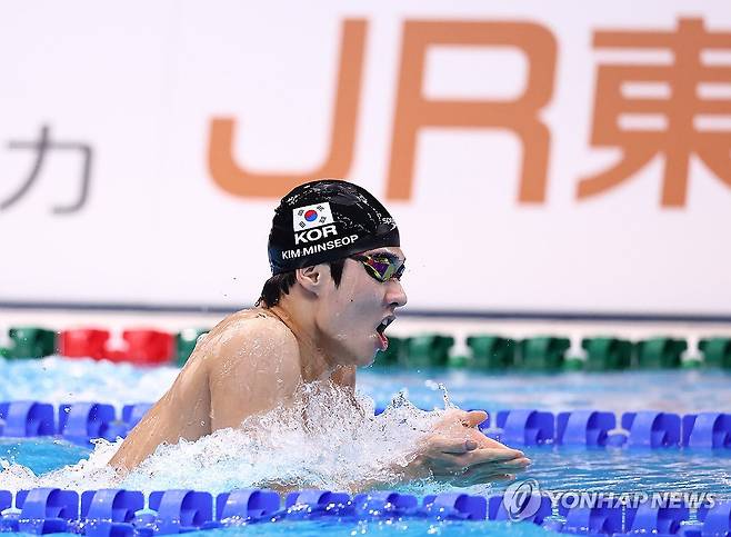 역영하는 김민섭 (도쿄=연합뉴스) 윤동진 기자 = 22일 도쿄 아쿠아틱스 센터에서 열린 2026 아이치·나고야 아시안게임 수영 남자 400m 개인 혼영 결승. 한국 김민섭이 역영하고 있다. 2026.9.22 mon@yna.co.kr