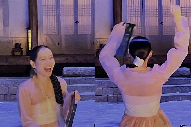 Actress Son Ye-jin shared behind-the-scenes photos from the filming of Scandal.On the 22nd, Son Ye-jin posted several photos on her account along with the caption, I cant believe I was this happy after filming ended. Please give Scandal lots of attention and love on Netflix right now.On this day, Son Ye-jin shared photos from the set of the Netflix series Scandal. She is seen smiling under party decorations prepared to mark the end of filming.The farewell message on the slogan, I am pretending to be alive while dying because I can no longer see Mrs. Jo. If you are going this way, please step over me, added a touch of humor. Mrs. Jo is the character played by Son Ye-jin in Scandal.Another photo captured Son Ye-jin beaming with a broad smile while wearing her filming costume. Her grinning face, revealing even her white teeth, brought a smile to everyones face.Son Ye-jin also struck a victory pose, raising both arms high. The joy and sense of relief from successfully completing the filming were fully conveyed.Meanwhile, Scandal, starring Son Ye-jin, tells the story of a daring and dangerous love bet between Lady Jo (played by Son Ye-jin), a woman with exceptional talents too great to be confined to living as a woman in the Joseon Dynasty, and Jo Won (played by Ji Chang-wook), the greatest lover in Joseon, as well as Hee-yeon (played by Nana), a woman entangled in that bet. It was released on the 18th.Additionally, Son Ye-jin married actor Hyun Bin in 2022 and welcomed a son in November of the same year.Photo = Son Ye-jins account