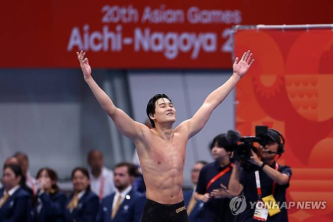 김영범 ‘신성 등장’ (도쿄=연합뉴스) 윤동진 기자 = 21일 도쿄 아쿠아틱스 센터에서 열린 2026 아이치·나고야 아시안게임 수영 남자 50m 개인 자유형 결승. 1위로 결승선을 통과한 한국 김영범이 기뻐하고 있다. 2026.9.21 mon@yna.co.kr