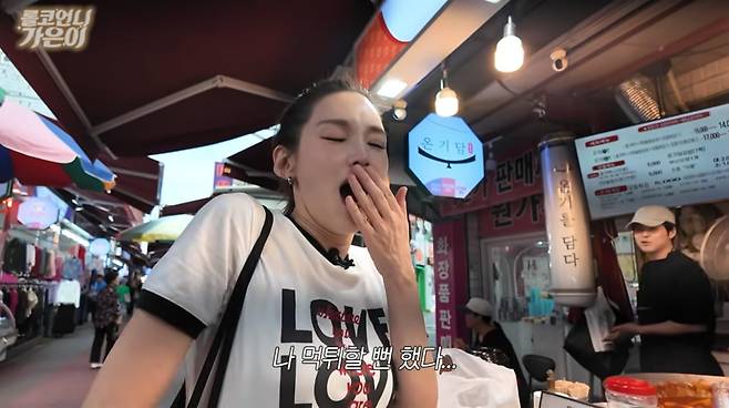 Actress Jung Ga-eun broke out in a cold sweat when she nearly ate and ran at a market.On the 28th, a video titled What Does 171cm, 50kg, 49-Year-Old Jung Ga-eun Eat at the Market? [Guri Market Edition] was posted on the YouTube channel Roller Coaster Unnie Ga-eun.On this day, Jung Ga-eun visited Guri Market near her home. She said, I lived in Guri for five years but didnt know about this place. I came near here while looking for an English academy, but Ive never actually been inside the market.Upon entering the market, Jung Ga-eun looked around at various items and reminisced. She marveled, There really isnt anything missing. There are even cosmetics. She continued, Kids these days wear a lot of makeup, dont they? We didnt back in my day. We only started wearing makeup when we became college students.In the meantime, Jung Ga-eun spotted a mannequin wearing a hat and asked the production crew, Dont these look like me? When the production crew didnt answer immediately, she pointed to a mannequin and asked again, Doesnt this one look like me? drawing laughter. The crew chimed in, It does look a bit like him.Jung Ga-eun was previously known as a Song Hye-kyo lookalike and earned the nickname Rollercoaster Goddess while appearing on tvNs *Rollercoaster*. Her signature bright energy was evident even as she playfully teased a mannequin about her lookalike in the middle of a market.In front of a snack bar, she couldnt hide her delight at seeing tteokbokki. Jung Ga-eun ordered the tteokbokki, saying, I cant stand garaetteok (long, cylindrical rice cakes). When bean sprouts were placed on top of the tteokbokki, she was surprised, asking, Do bean sprouts and tteokbokki go well together? Its the first time Ive seen that.After finishing her meal, Jung Ga-eun said, I was sweating profusely while eating the tteokbokki. It was delicious. At that moment, a merchant stopped her, saying, Im sorry, but you havent paid yet. Startled, Jung Ga-eun quipped, Im sorry. I almost ran off without paying. I thought you were coming over to ask me to take a picture.Meanwhile, Jung Ga-eun is raising her daughter alone following her divorce. She has previously shared stories of financial hardship due to fluctuating income and her experience trying her hand at being a taxi driver. Currently, she continues her acting career, focusing on theater, while communicating with the public through social media and YouTube.