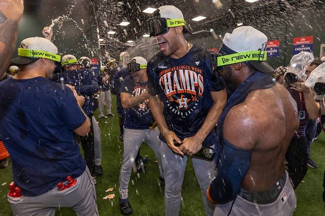 Astros Athletics BaseballHouston Astros' Cam Smith, center, celebrates after his team clinched the AL West division title in a baseball game against the Athletics, Sunday, Sept. 27, 2026, in West Sacramento, Calif. (AP Photo/Sara Nevis)