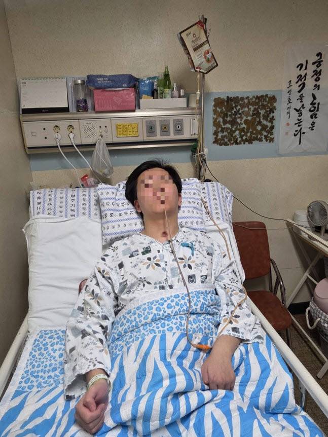 복싱 대회 사고 이후 1년이 지난 시점에서도 여전히 의식을 찾지 못하고 있는 조연호 군. 사진=가족 제공