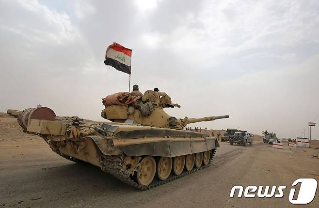 이라크 하위자로 진격하는 이라크군. © AFP=뉴스1