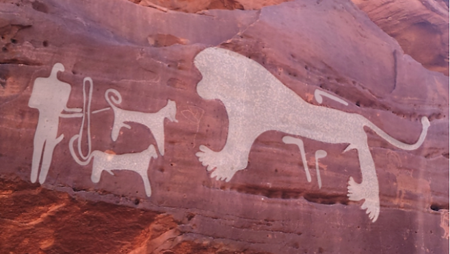 사냥꾼과 개 두 마리가 커다란 수사자와 맞서고 있다. - ‘인류학적 고고학 저널’ 제공