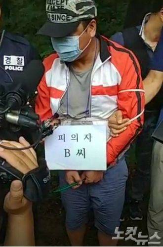 지난해 7월 현장검증 중인 범인 (사진=자료사진)