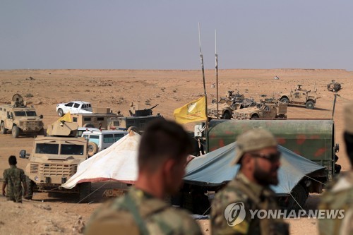 시리아 동부에서 IS 격퇴전을 수행하는 시리아민주군과 지원 병력 [AFP=연합뉴스]