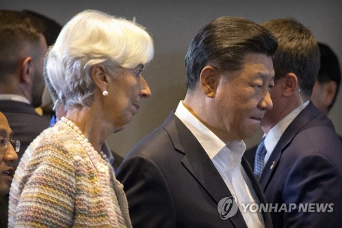 크리스틴 라가르드 IMF 총재와 시진핑 중국 국가주석[AP=연합뉴스 자료사진]