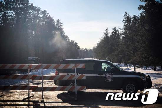 제이미 클로스가 발견된 장소에 서 있는 경찰차. © AFP=뉴스1