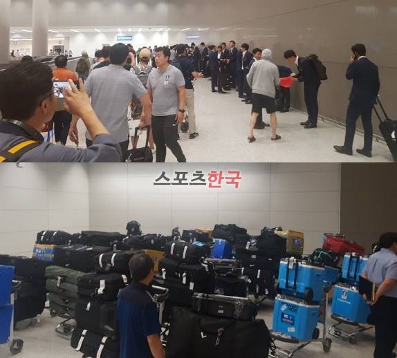 러시아 월드컵 대표팀이 귀국직전 수화물 찾는곳 앞에서 대기하고 있는 모습